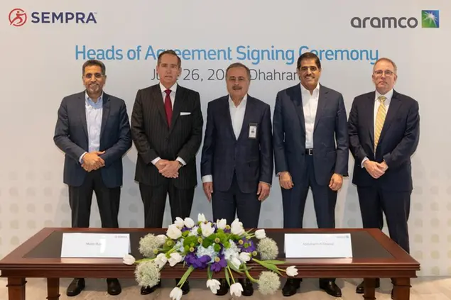 <p>At the signing ceremony, from left: Aramco Executive Vice President of Gas Abdulkarim A. Al-Ghamdi, Sempra Chairman and CEO Jeffrey W. Martin, Aramco President &amp; CEO Amin H. Nasser, Aramco Upstream President Nasir K. Al-Naimi, and Sempra Infrastructure President of LNG Martin&nbsp;Hupka</p>\\n