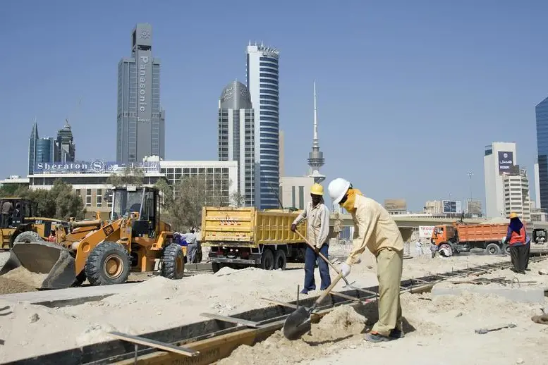 Image used for illustrative purpose. Construction workers are seen on the site of a newly constructed bridge that is nearing completion at the Jahra roundabout in Kuwait City September 1, 2011. STR New, Reuters , Reuters Images