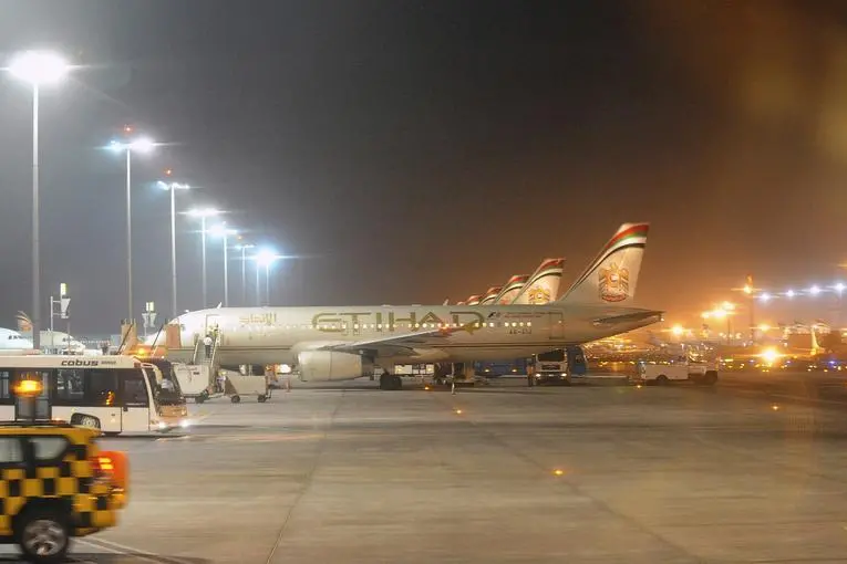 Etihad Airways aircraft are seen at Abu Dhabi International Airport, September 19, 2012. REUTERS/Ben Job. , Reuters Images