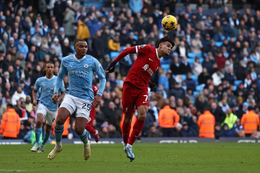 Man City Rallies to Win Premier League, Edging Liverpool by a