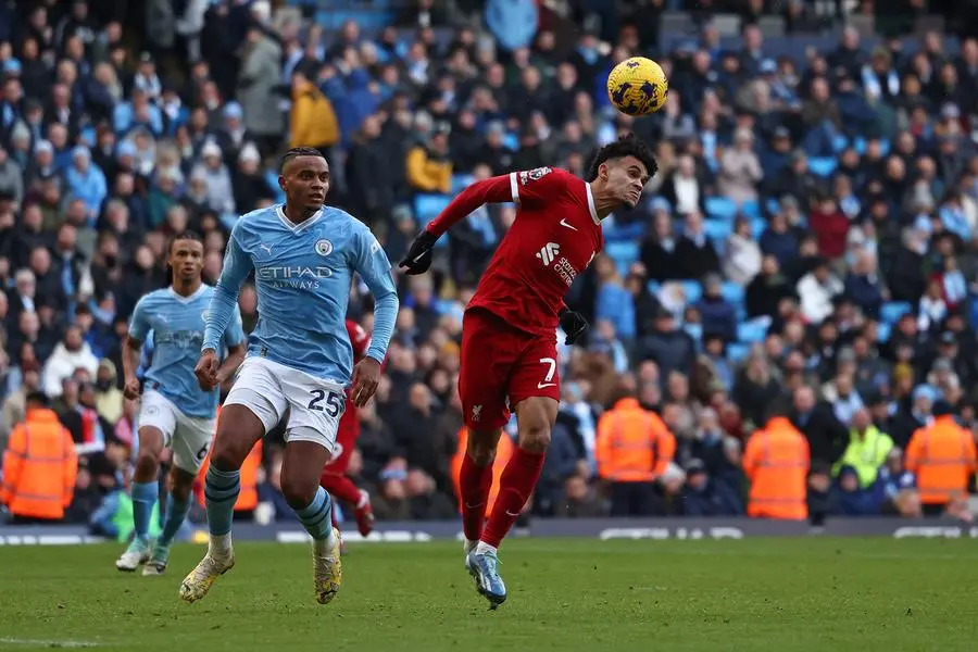 Man City humble Liverpool, close point on Arsenal