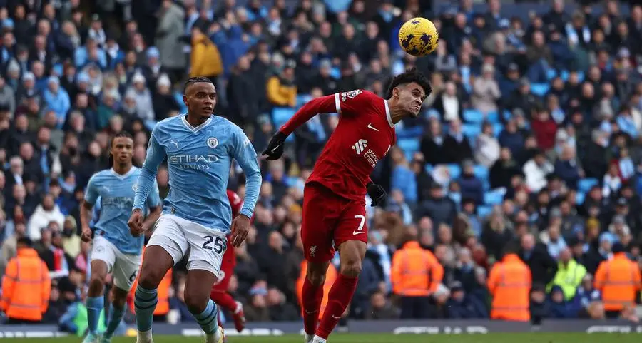 Liverpool hold Man City as Arsenal go top