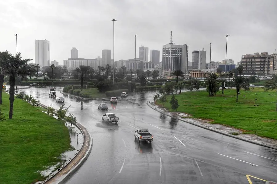 Vehicles pass by a flooded road following heavy rain, in Jeddah, Saudi Arabia, November 24, 2022. Saudi Press Agency/Handout via REUTERS