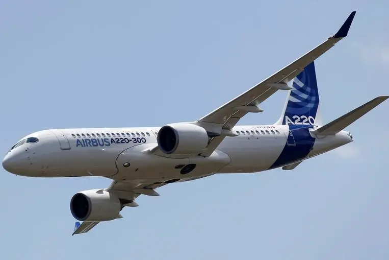 An Airbus A220-300 aircraft flies during its unveiling in Colomiers near Toulouse, France, July 10, 2018. Airbus A220 is the new brand for the small CSeries passenger jet acquired from Canada\\'s Bombardier. REUTERS/Regis Duvignau - RC1981CC1600 , Reuters Images