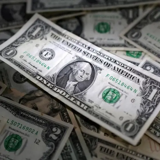 Dollar edges up ahead of Fed decision, euro slides ahead of GDP data