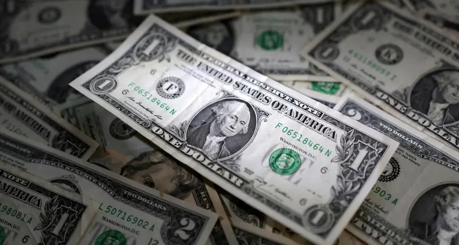 Dollar edges up ahead of Fed decision, euro slides ahead of GDP data
