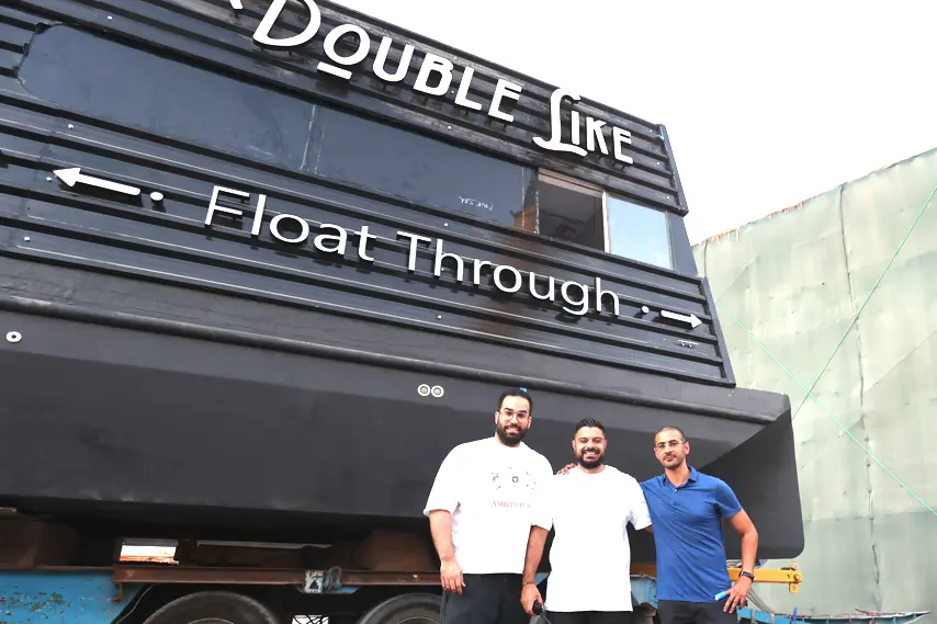 From Left to Right - Double Like owners and Aqua Pod creator preparing to offload Aqua Pod into the water