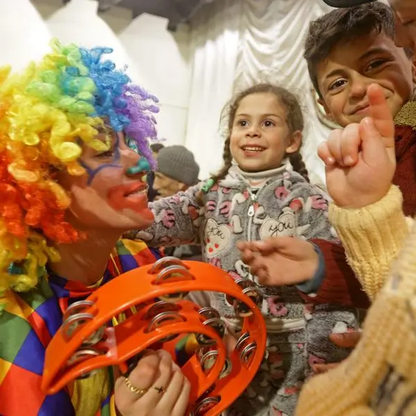 Hot meals, kids' theatre: volunteers help Syria quake survivors
