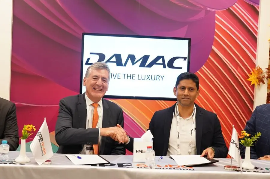 During the agreement signing ceremony between DAMAC Hotels and Aruba Networking. Image Courtesy: DAMAC Hotels