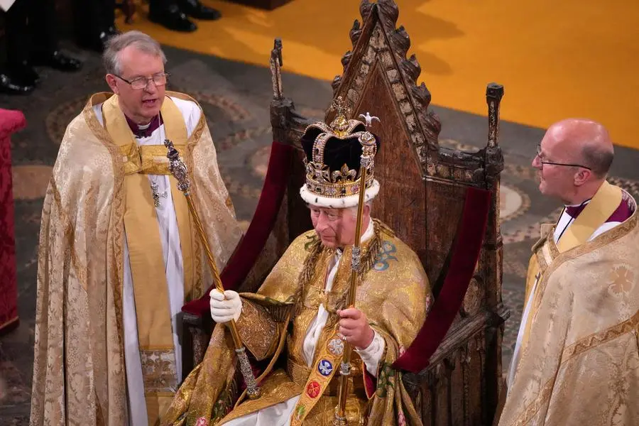King Charles III after being crowned with St Edward's Crown by The Archbishop of Canterbury the Most Reverend Justin Welby during his coronation ceremony in Westminster Abbey, London. Picture date: Saturday May 6, 2023. Aaron Chown/Pool via REUTERS
