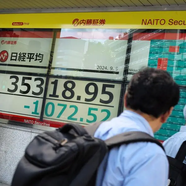 Asian markets fluctuate on uncertainty over Fed rate plan