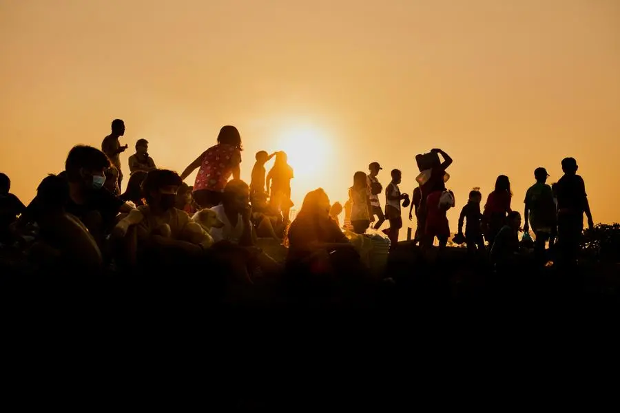 MANILA, PHILIPPINES - MARCH 07: Filipino families flock to a makeshift beach in the polluted waters of Manila bay to escape the summer heat on March 7, 2021 in Manila, Philippines. (Photo by Jes Aznar/Getty Images) , Getty Images