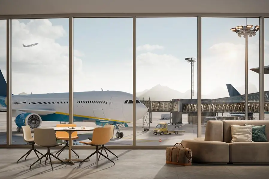 Airplane parked at terminal seen from the airport lounge. Getty Images Image used for illustrative purpose. , Getty Images