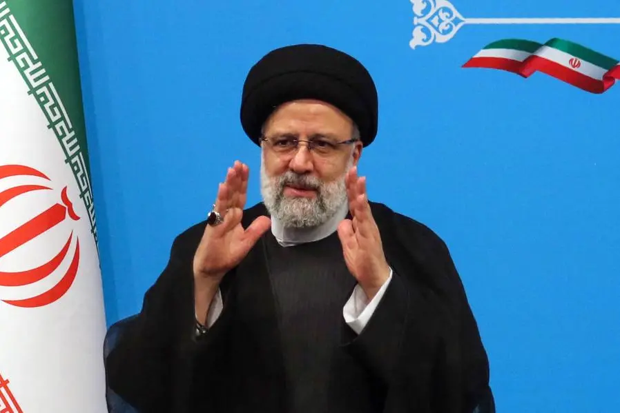 Iran\\'s President Ebrahim Raisi greets media representatives after a press conference in Tehran on August 29, 2023. (Photo by AFP) , Agence France-Presse (AFP)/AFP