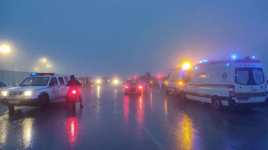 In this photo provided by MojNews on May 19, 2024, rescuers gather before heading towards the site of the \\\"accident\\\" involving a helicopter in the convoy of Iran's President in the Jolfa region of the western province of East Azerbaijan. (Photo by AZIN HAGHIGHI / MojNews / AFP)