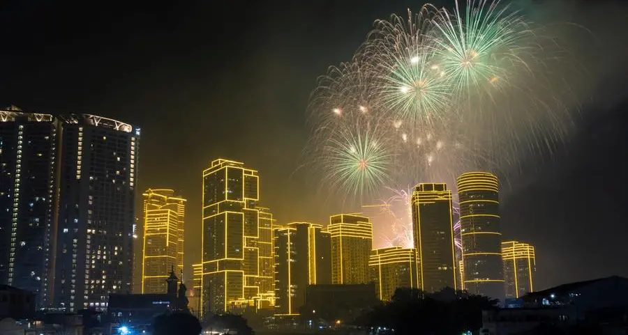 World welcomes 2024 with New Year's fireworks, reflection and a royal farewell