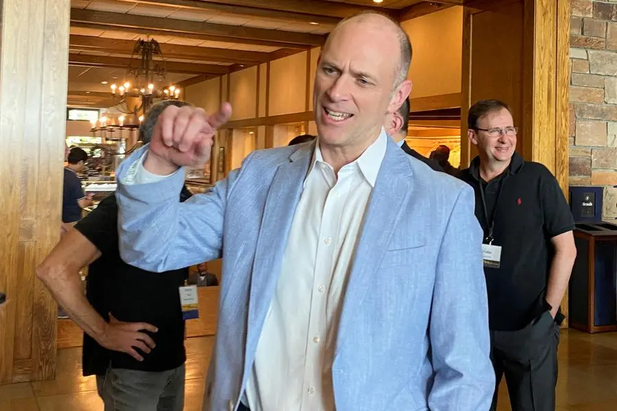 FILE PHOTO: Chicago Fed President Austan Goolsbee speaks as he heads into the Kansas City Fed\\'s annual economic symposium in Jackson Hole, Wyoming, U.S., August 24, 2023. REUTERS/Ann Saphir/File Photo , Reuters