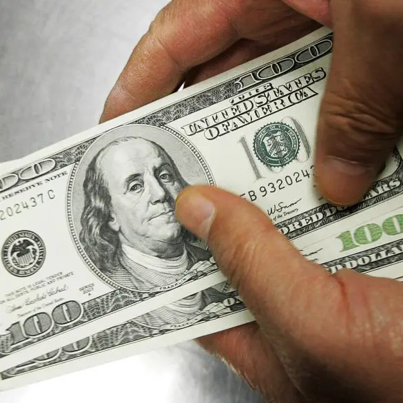 Dollar slips as Nvidia buoys investor hopes in absence of tariff news