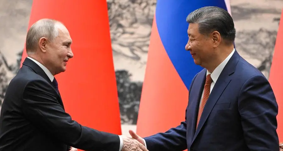 Xi, Putin hail ties as 'stabilising' force in chaotic world