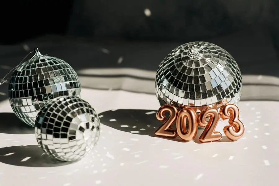 New Year 2023 silver balloons with fireworks. Getty Images Image used for illustrative purpose. , Getty Images
