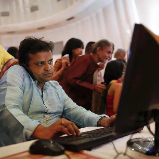 Indian shares flat as Adani, energy stocks offset IT fall