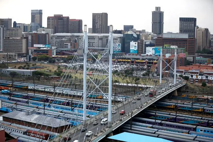 The city of Johannesburg over looks the Mandela bridge, with trains parked underneath, in Johannesburg, South Africa, November 15, 2018. Siphiwe Sibeko, Reuters. Image used for illustrative purpose.