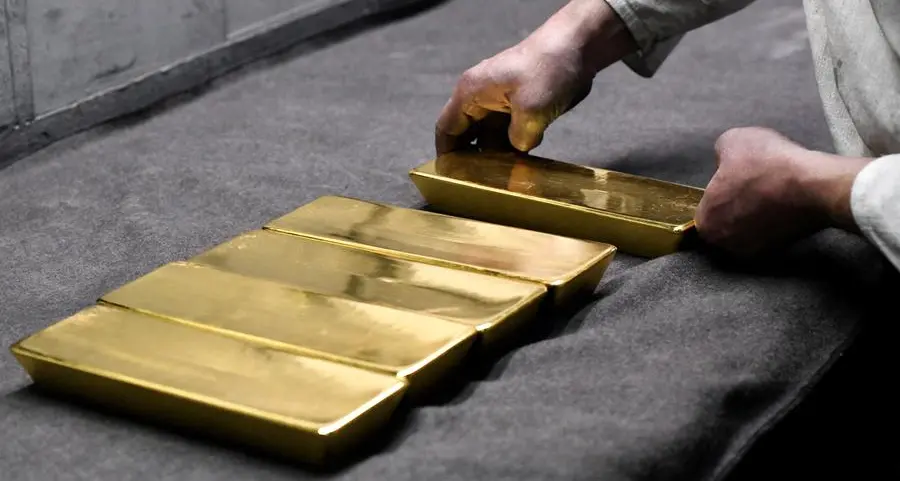 Gold retreats as investors await US economic data