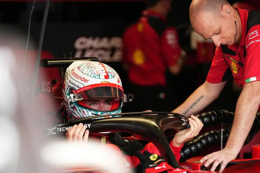 May 6, 2023; Miami Gardens, Florida, USA; Ferrari driver Charles Leclerc (16) of Monaco gets into his car during practice for the Miami Grand Prix at Miami International Autodrome. Mandatory Credit: Jasen Vinlove-USA TODAY Sports