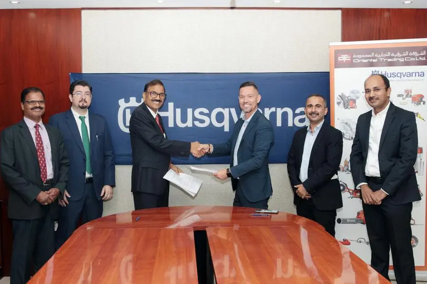 V S Narayanan, Managing Director, Oriental Trading Co Ltd (OTC) and Jeff Bennet, General Manager, Husqvarna Middle East, shake hands after they signed an agreement during a product launch of Husqvarna, at the OTC office in Doha yesterday. Picture by: Salim Matramkot/The Peninsula