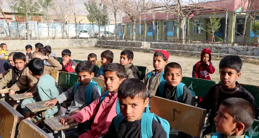 Afghan schools restart, with girls barred for third year running