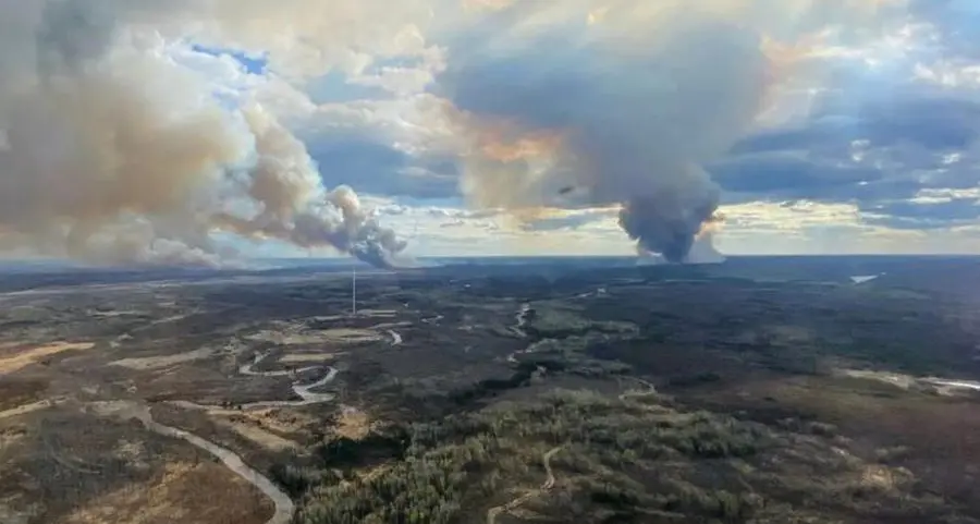 Canadian oil sands city evacuated as wildfire draws near