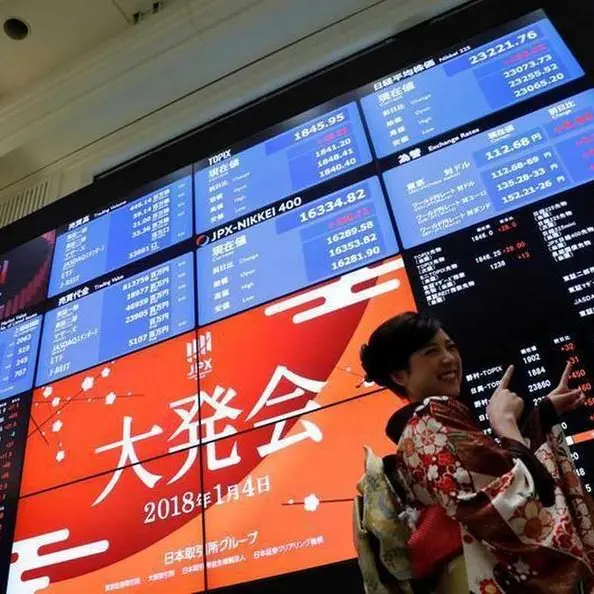 Asia stocks rally as China data buoys mood; dollar stays strong