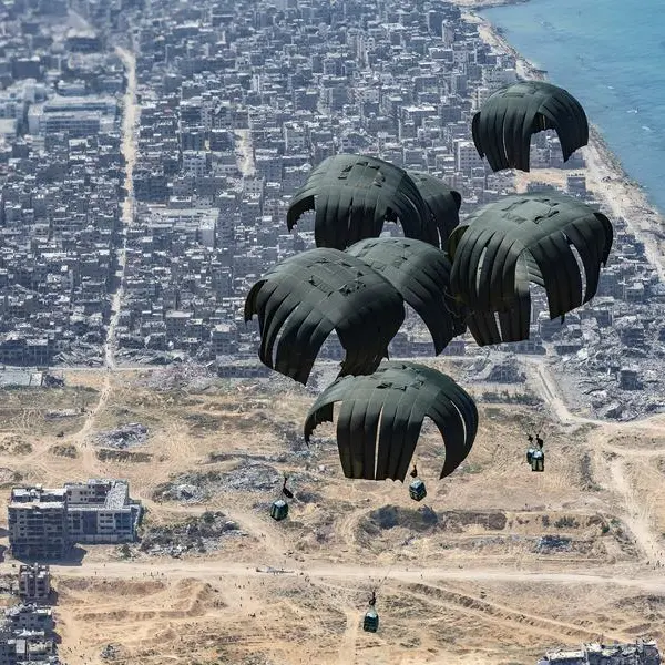 Gaza man turns aid parachute into shelter