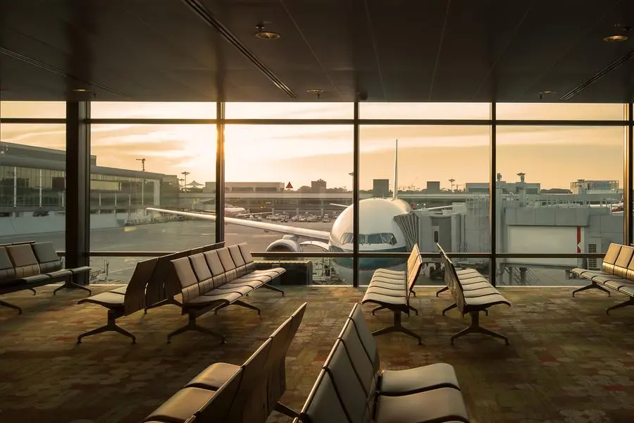 Airplane view from airport lounge in airport terminal. Getty Images Image used for illustrative purpose. , Getty Images