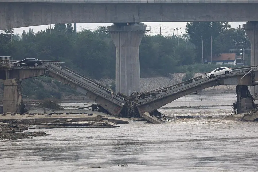 Beijing rains heaviest since records began 140 years ago