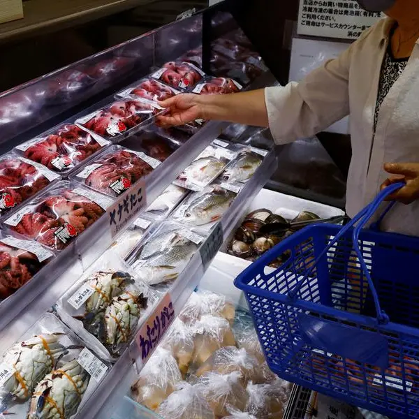 Japan's wholesale inflation perks up, yen rise eases cost pressure