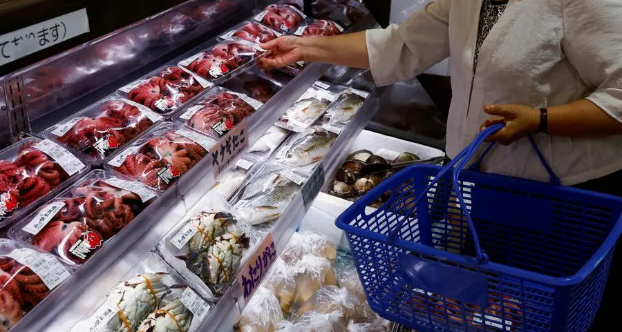 Japan's wholesale inflation perks up, yen rise eases cost pressure