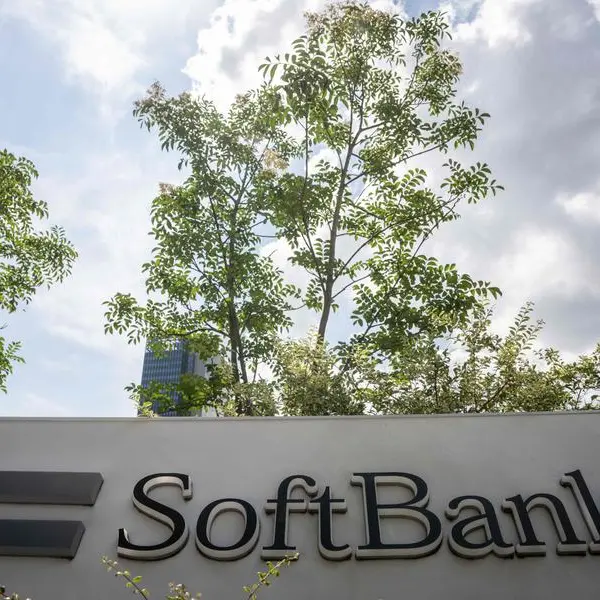 Japan's SoftBank announces major share buyback, narrows losses