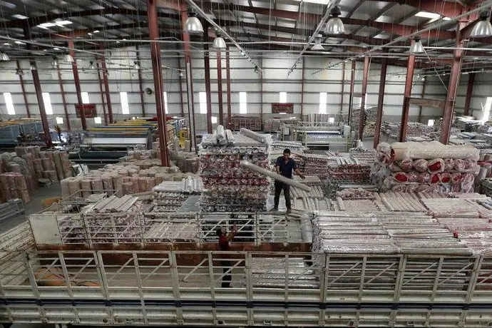 Image used for illustrative purpose. An employee works inside Akkad\\'s carpet factory in Jordan Industrial Estates Company in Al-Muwaqar south of Amman, Jordan, September 14, 2017. Muhammad Hamed, Reuters , Reuters Images