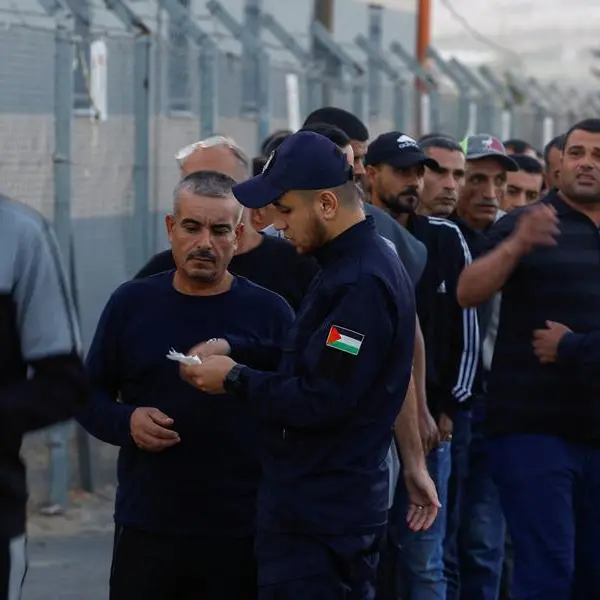 Israel reopens Gaza crossings, lets Palestinians back to work after two weeks