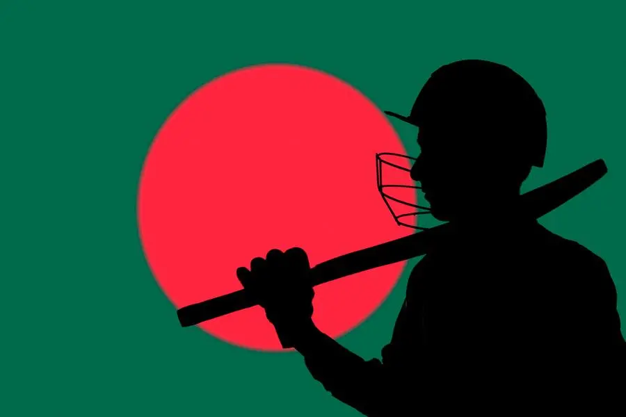 Cricketer silhouette on Bangladesh blurred flag background. Getty Images Image used for illustrative purpose.