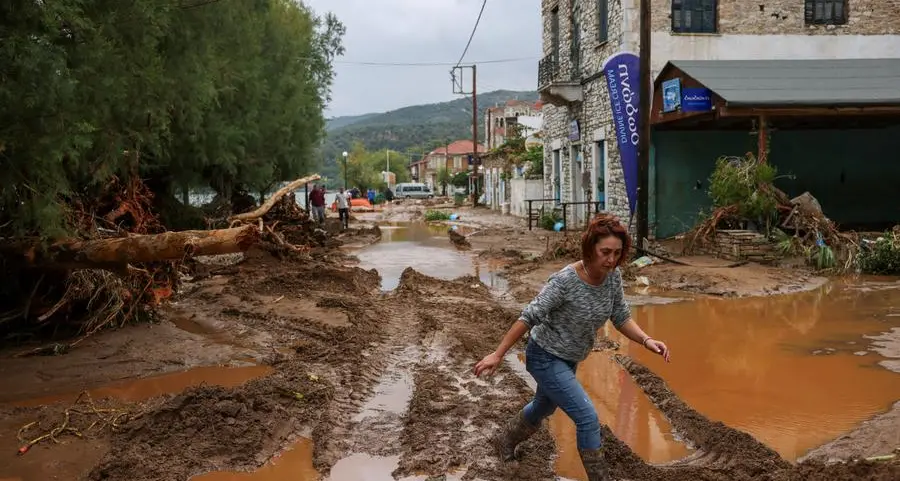 As deadly Greek rainstorm ebbs, a trail of devastation emerges