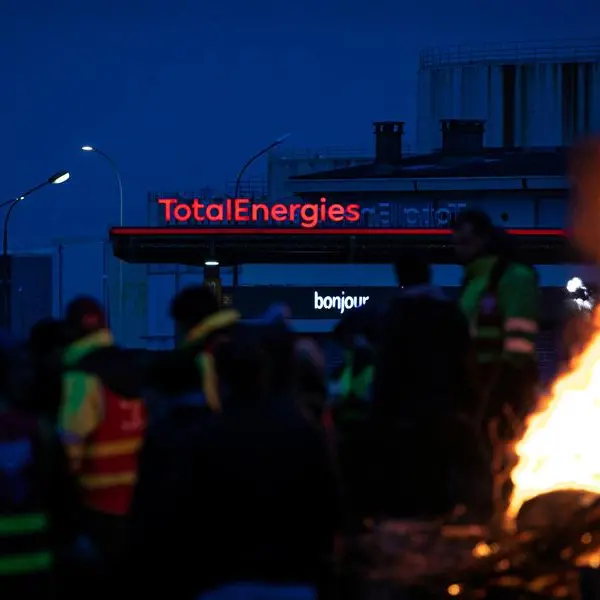 Paris police fire tear gas on protesters at oil giant's meeting