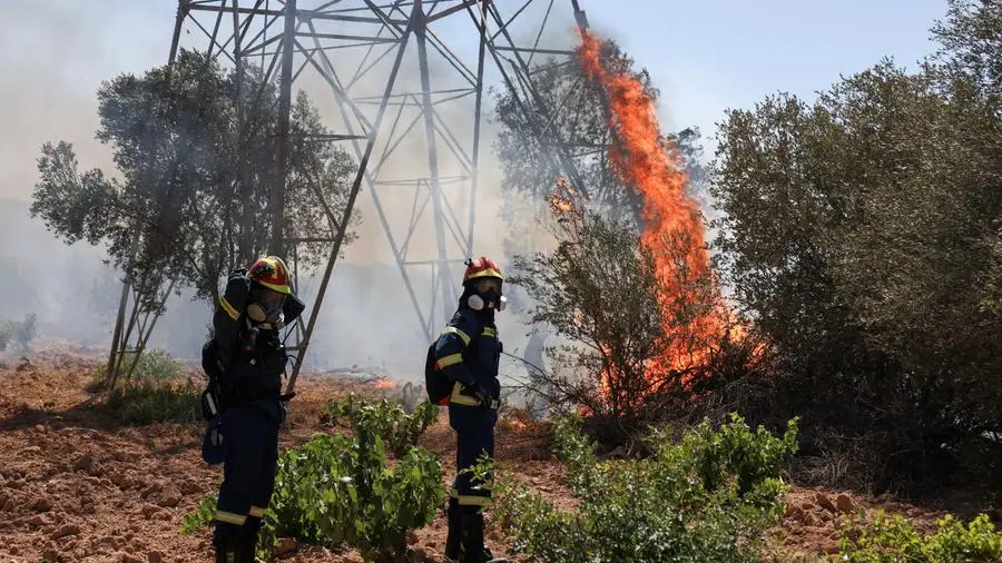 Greece battles wildfires fanned by gale force winds