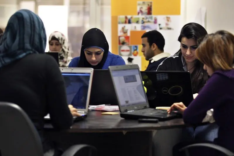 Image used for illustrative purpose only. Young entrepreneurs work on their laptops at the Amman-based Oasis 500, a seed investment firm which finances start-up firms in the region\\'s information technology sector, November 2, 2011.REUTERS/Muhammad Hamed. , Reuters