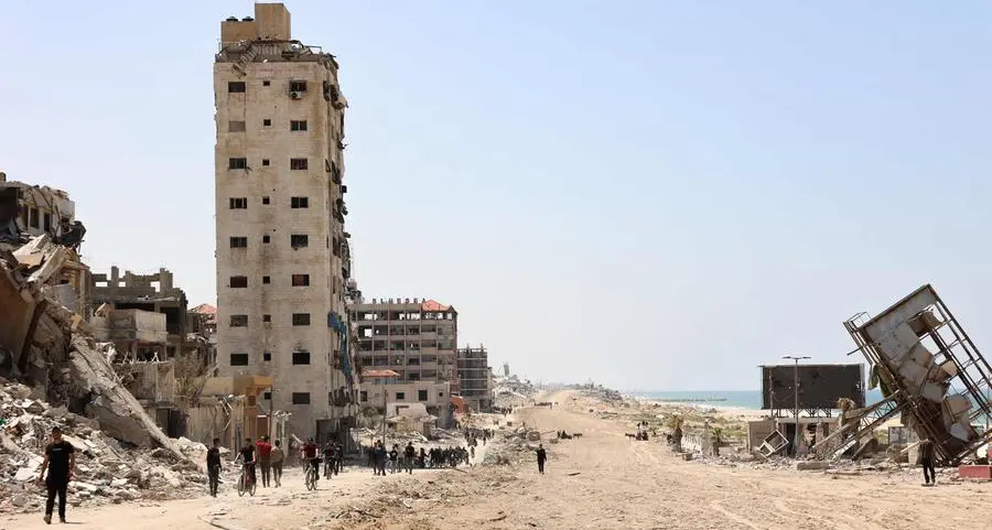 Israel presses on in Gaza as world awaits response to Iran attack