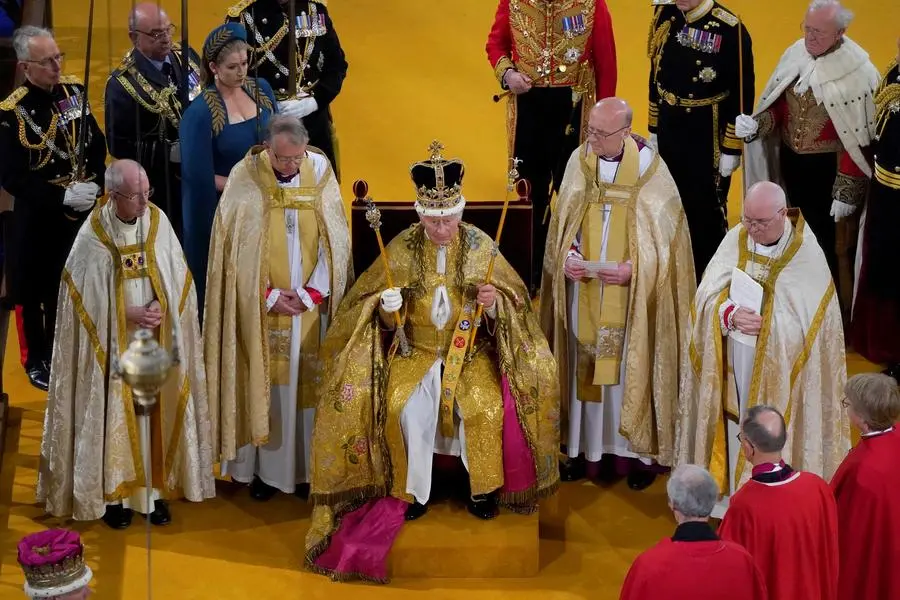 King Charles III receives The St Edward's Crown during his coronation ceremony in Westminster Abbey, London. Picture date: Saturday May 6, 2023. Andrew Matthews/Pool via REUTERS