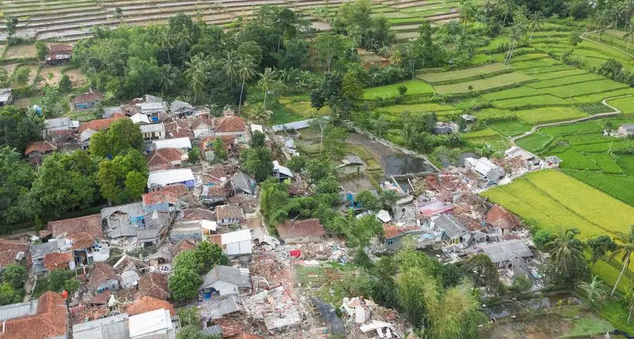 Worried Indonesians await news of earthquake-hit relatives