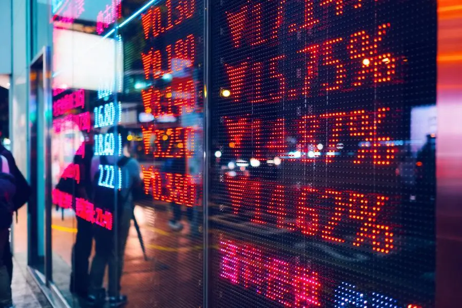 Stock exchange market display screen board on the street showing stock market crash sell-off in red colour. Getty Images Image used for illustrative purpose. , Getty Images/Getty Images