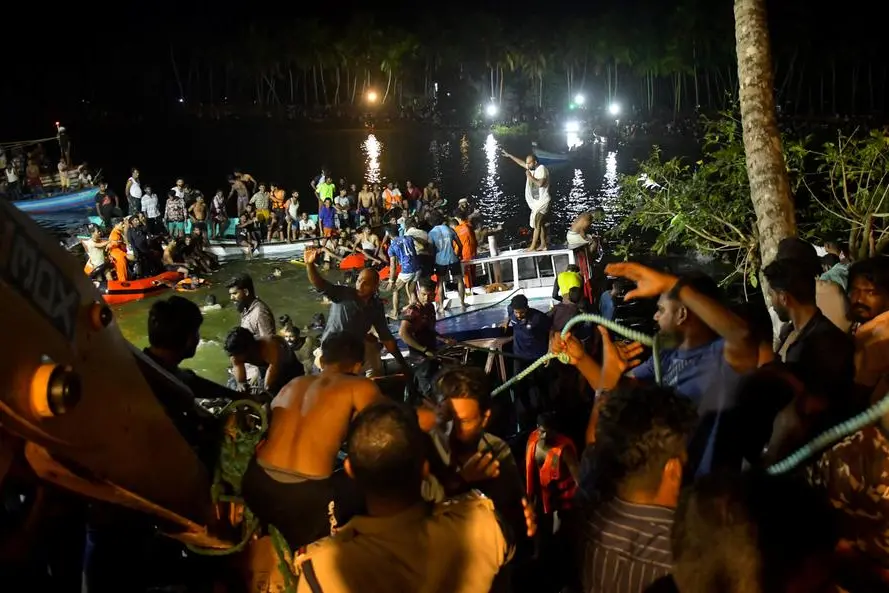Rescue team members search for survivors after a boat capsized off the coastal town of Tanur in the Malappuram district of the southern state of Kerala, India, May 7, 2023. REUTERS/Stringer , Reuters